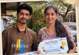 Parth Mahadik and team member holding certificates as 1st place winners at Devine Tech Solutions Hackathon