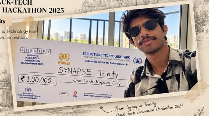 Parth Mahadik holding the ₹1,00,000 Hack-Tech Innovation Hackathon 2025 winner cheque for Team Synapse Trinity at Science and Technology Park